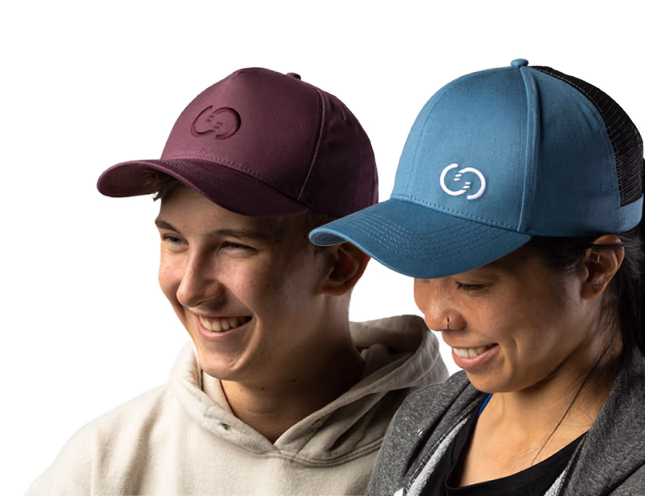 A headshot of a man wearing a maroon hat and a woman wearing a blue hat