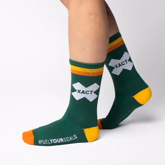 A pair of custom made green and yellow calf socks