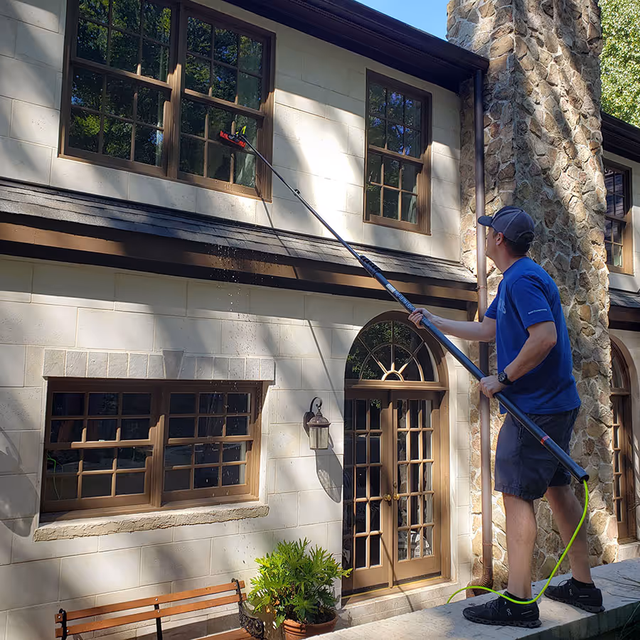 Water-fed pole window cleaning for a Birmingham home.