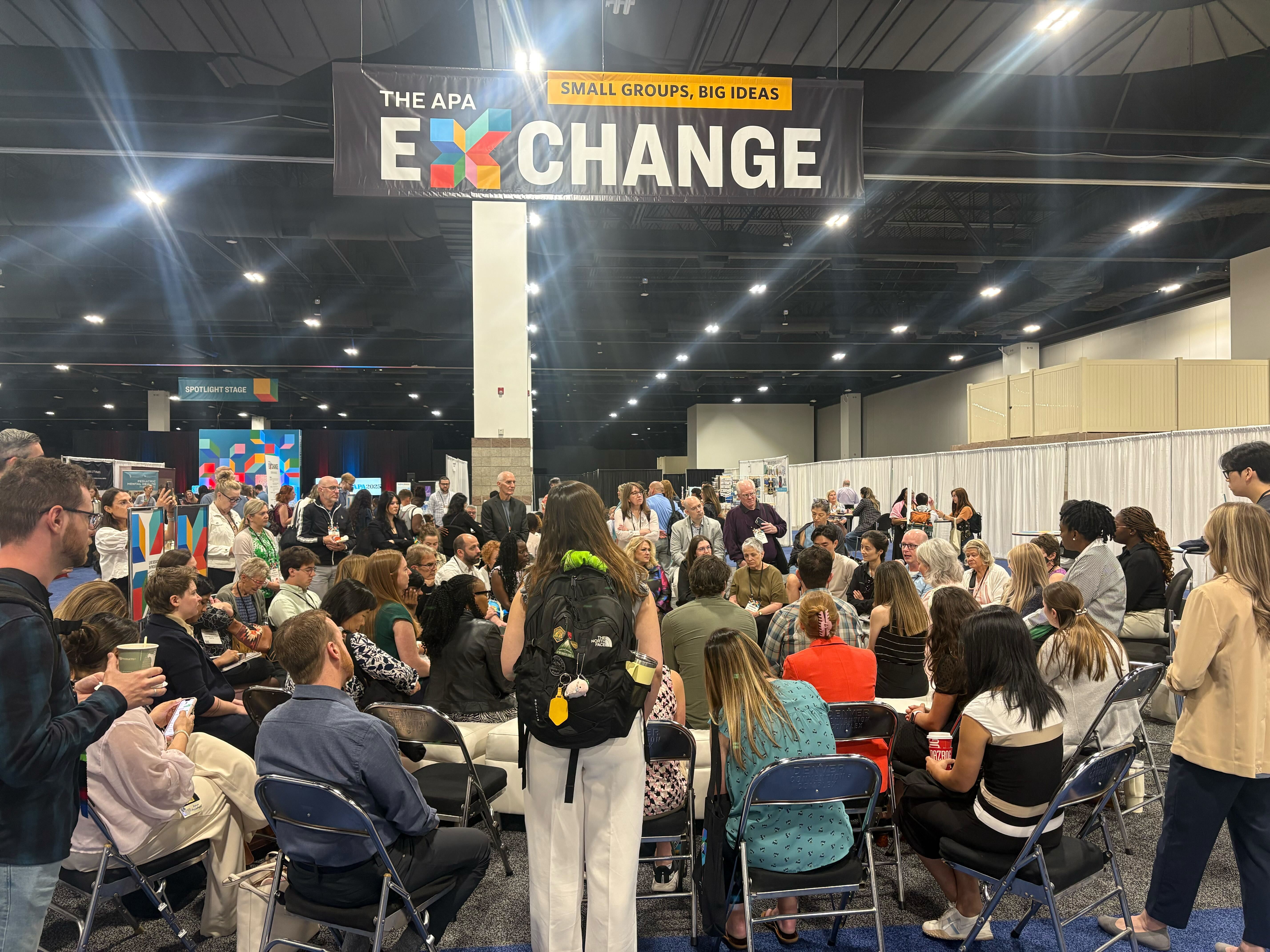 In image from the conference floor at APA 2025, showing Ted Faneuff in a panel discussion on AI replacing therapists.