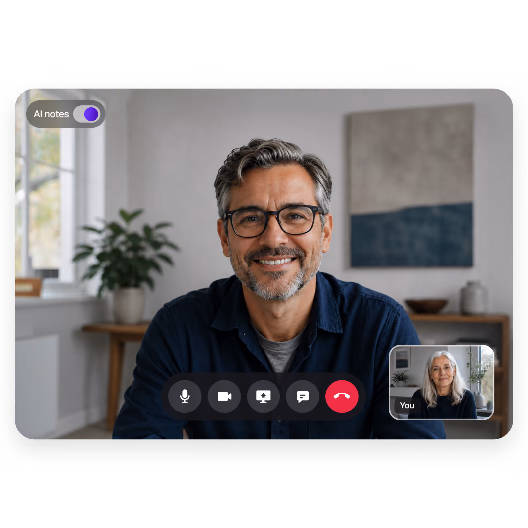 A therapist smiling while using Upheal’s HIPAA-compliant telehealth platform with AI note generation turned on.