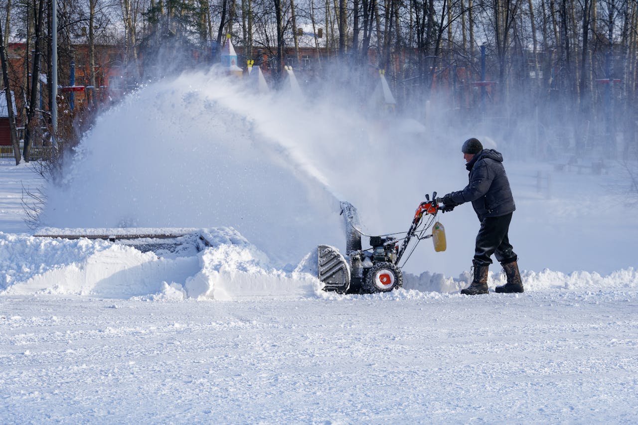 a man working on snow removal service