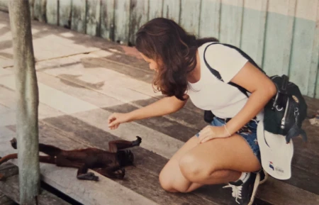 Grupo de pessoas reunidas em ambiente doméstico em Manaus em 1998