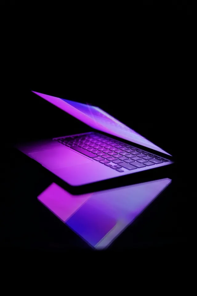 Laptop in purple light