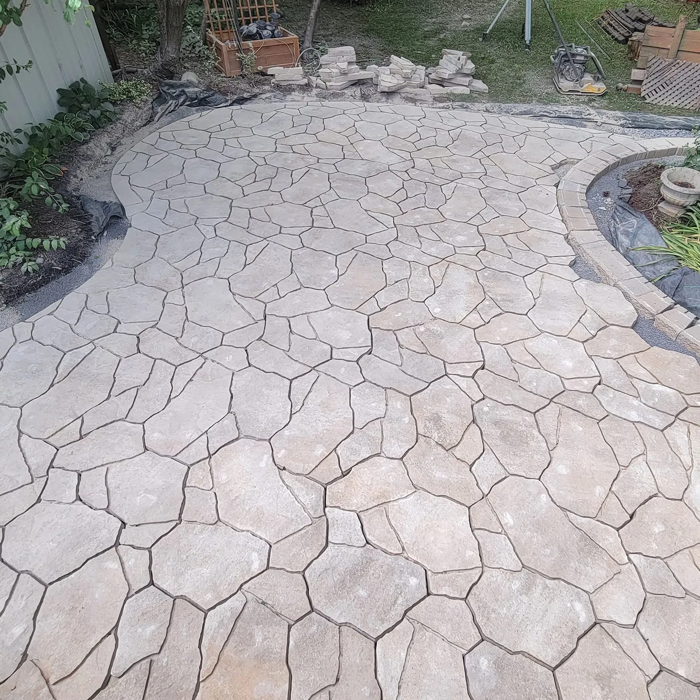 Rounded, organic shaped paver walkway