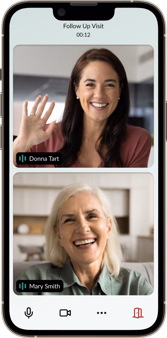 Video call on phone showing two smiling women named Donna Tart and Mary Smith in a follow-up visit.