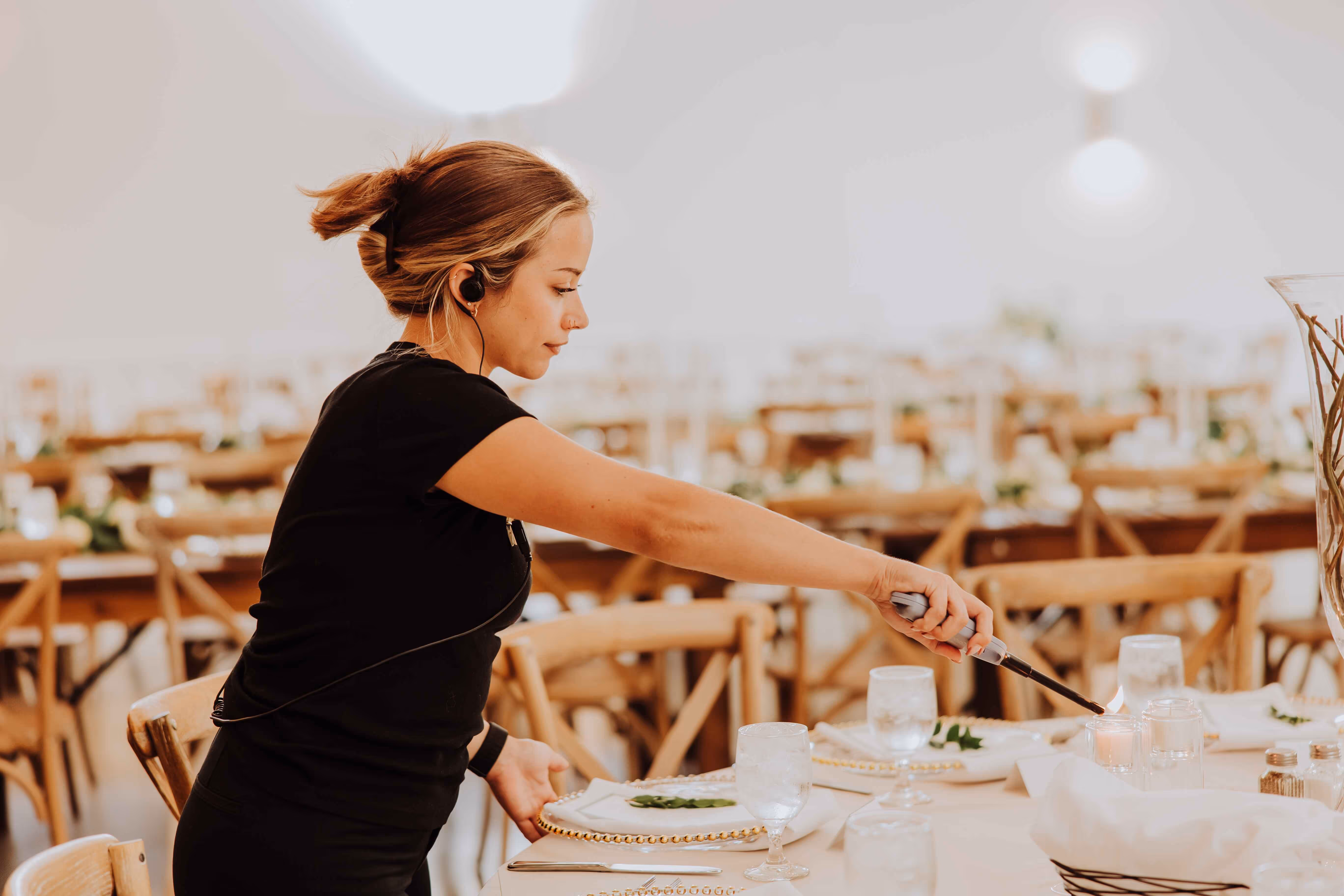 Ivy House wedding planning team preparing reception space in Saugatuck, Michigan