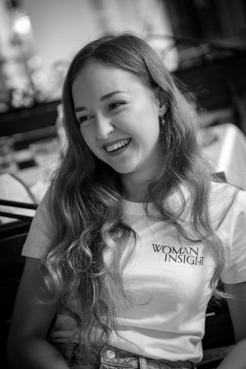 Anastasiia smiles at the office party