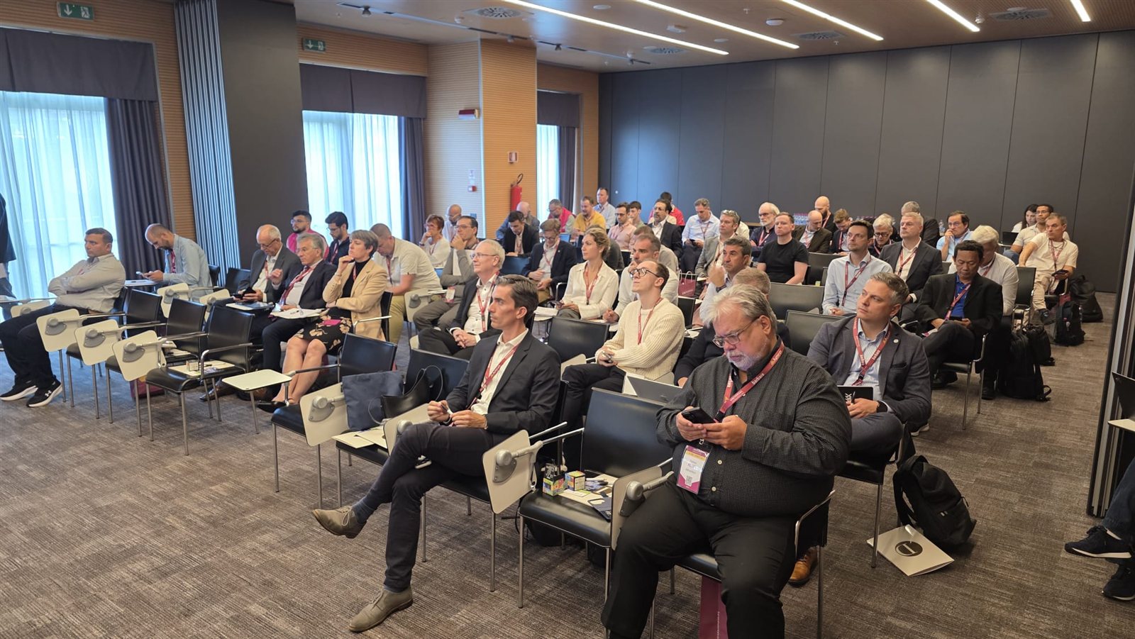 Attendees following a session at the UAO Global Summit 2026.