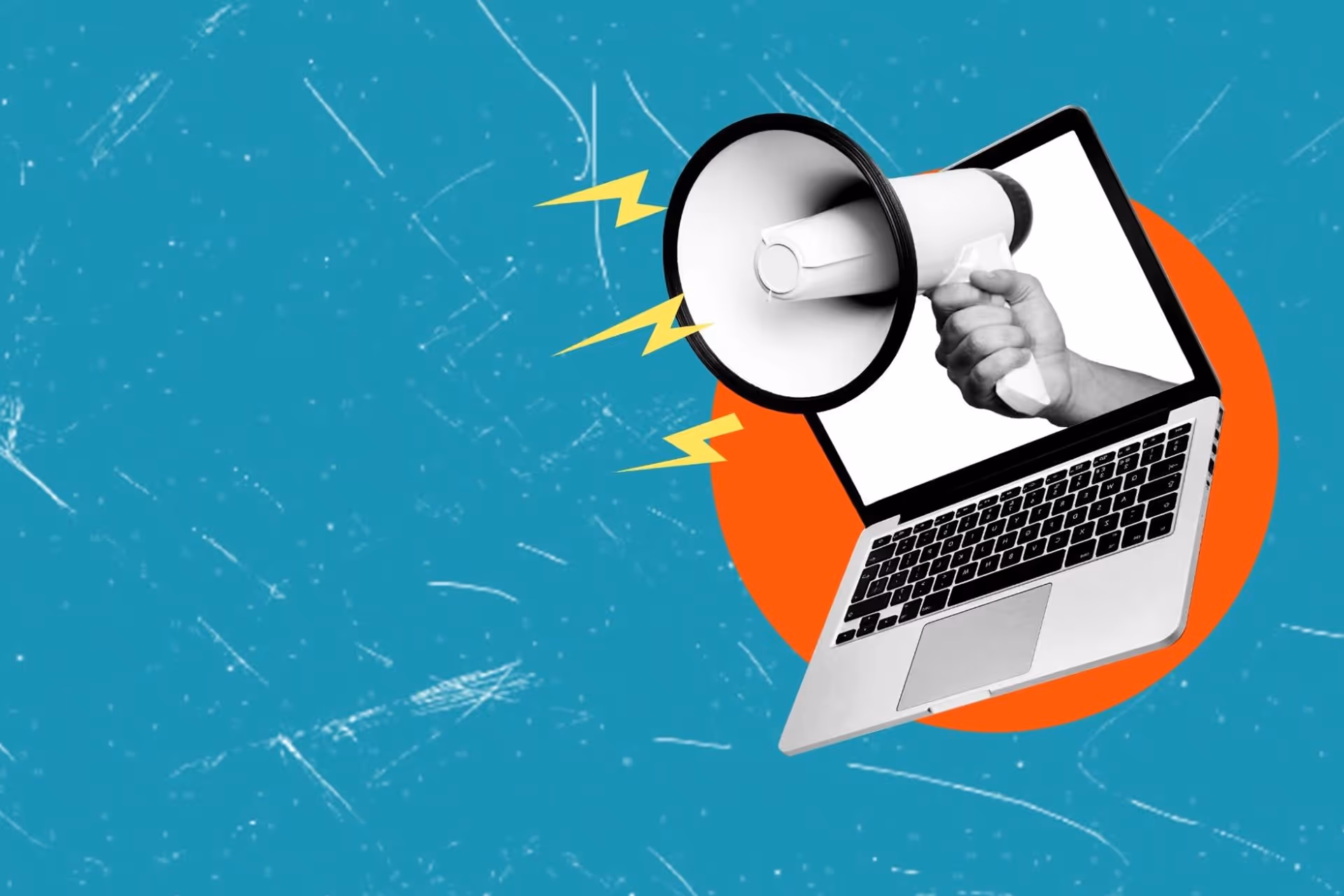 A graphic image of a megaphone coming through a laptop screen.