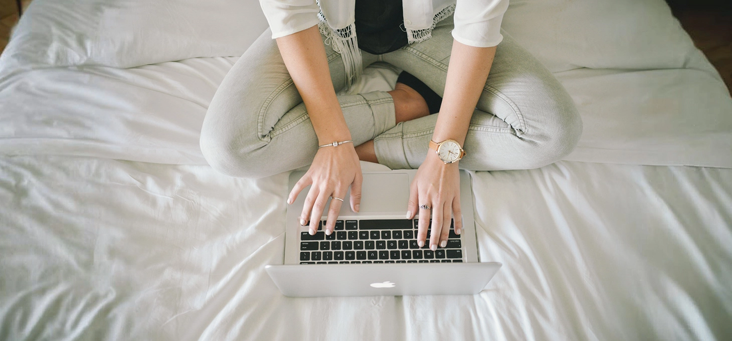 Marketer working from home on a laptop, creating SEO content briefs using ChatGPT