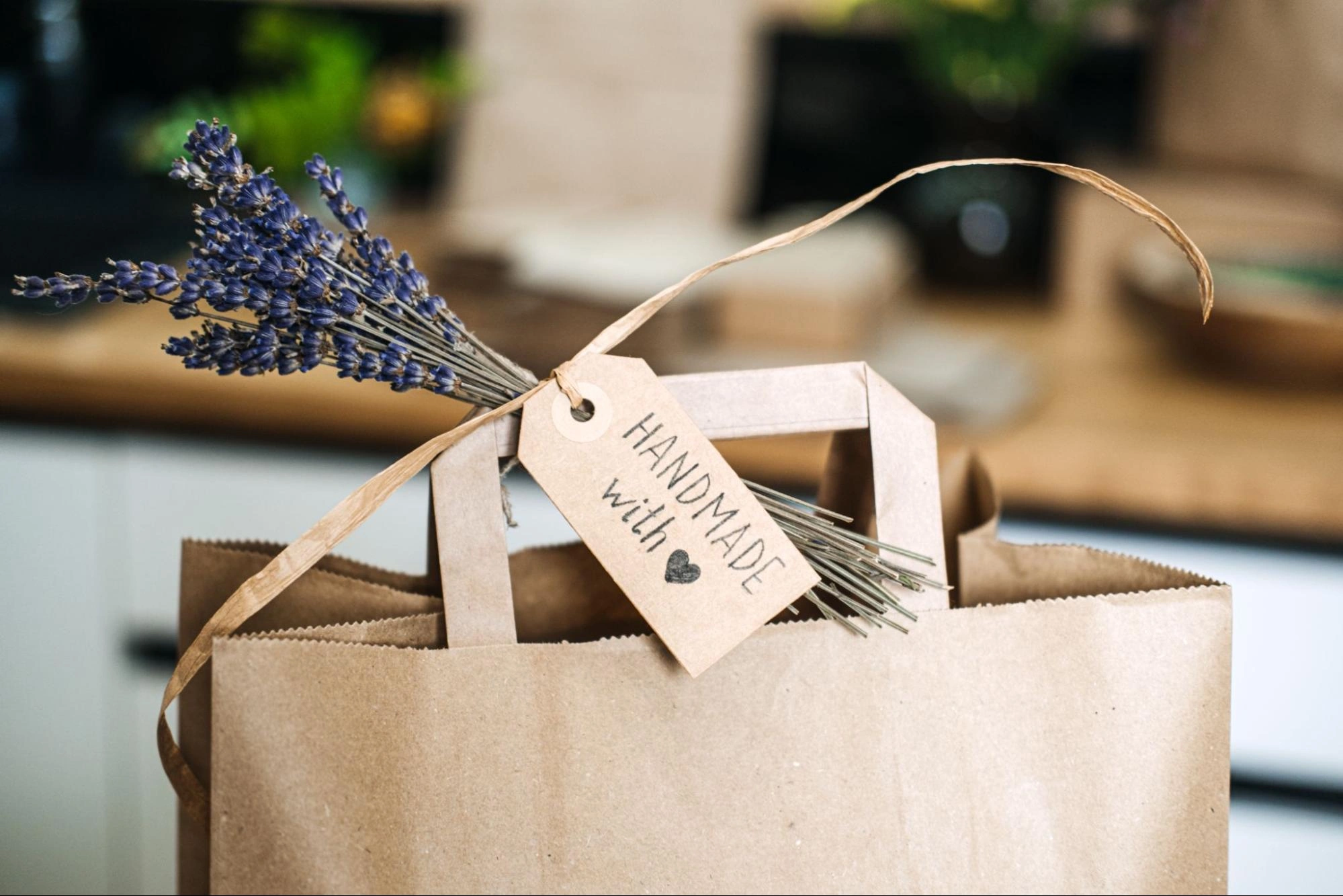 A handmade customer gift in a paper bag from an eco-conscious brand