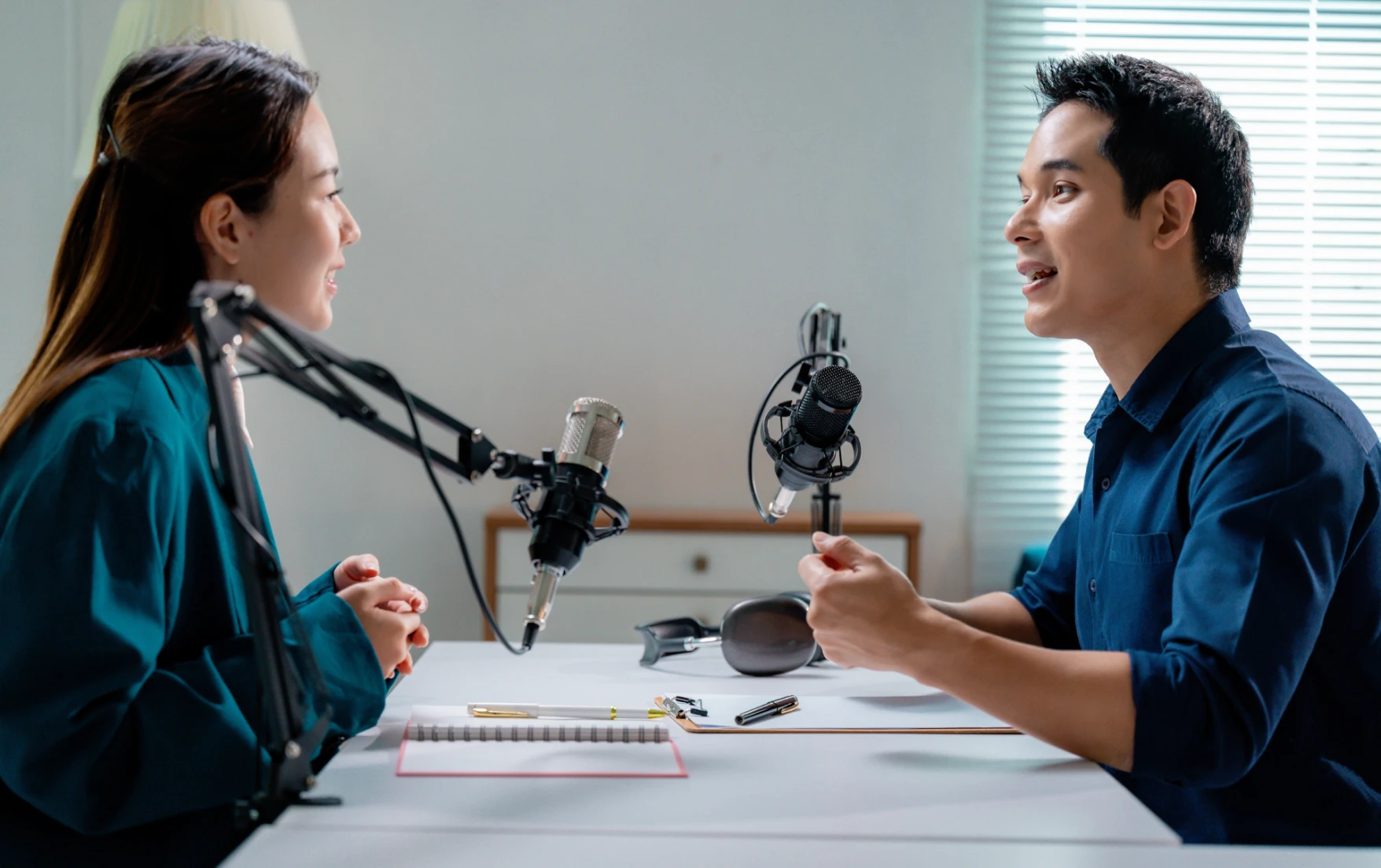 Marketing influencers recording a podcast