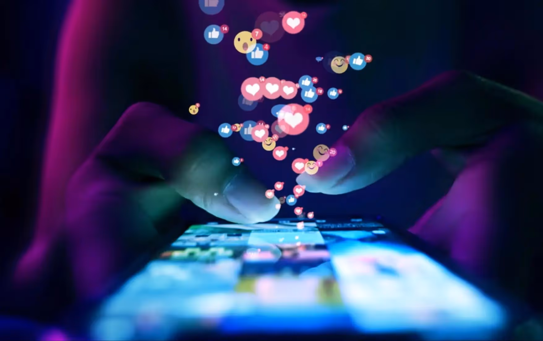 A finger touches a phone’s scrollpad