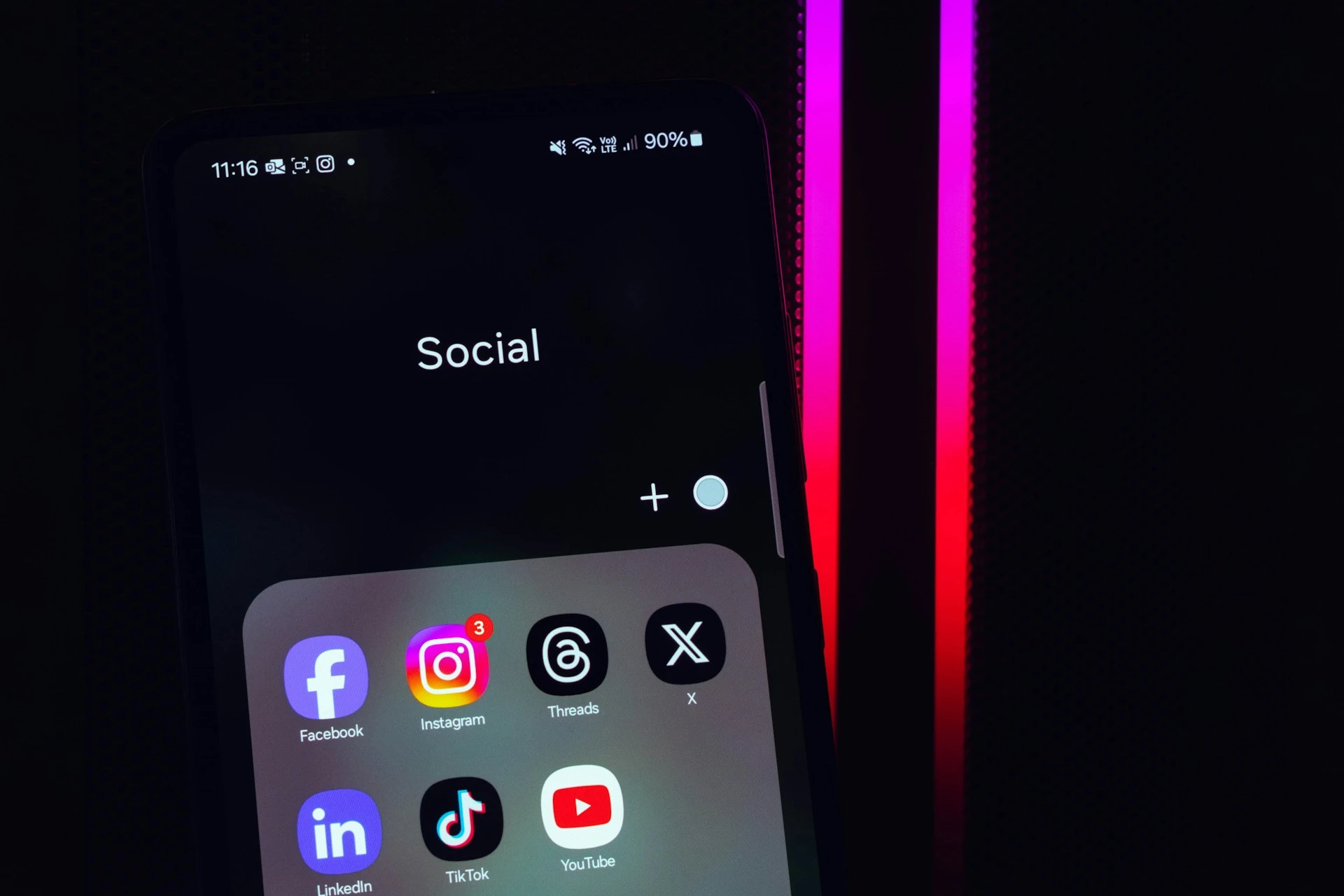 A smartphone home screen displaying seven social media icons, displayed on a dark background.