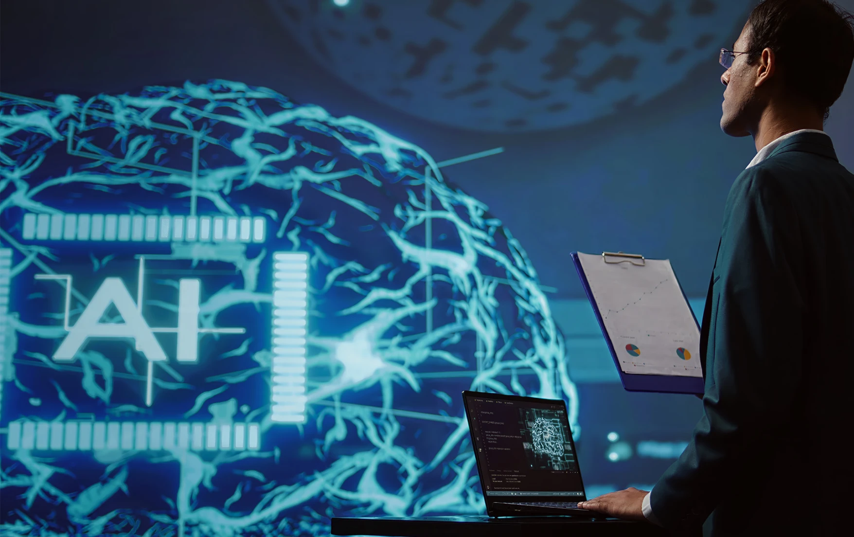 A man in a suit, holding a clipboard, stands in front of a laptop. A digital brain graphic labeled “AI” glows in the background, suggesting technology and innovation.
