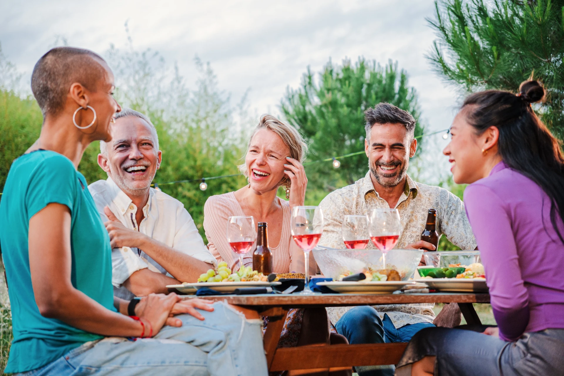 Baby boomers laughing while having brunch