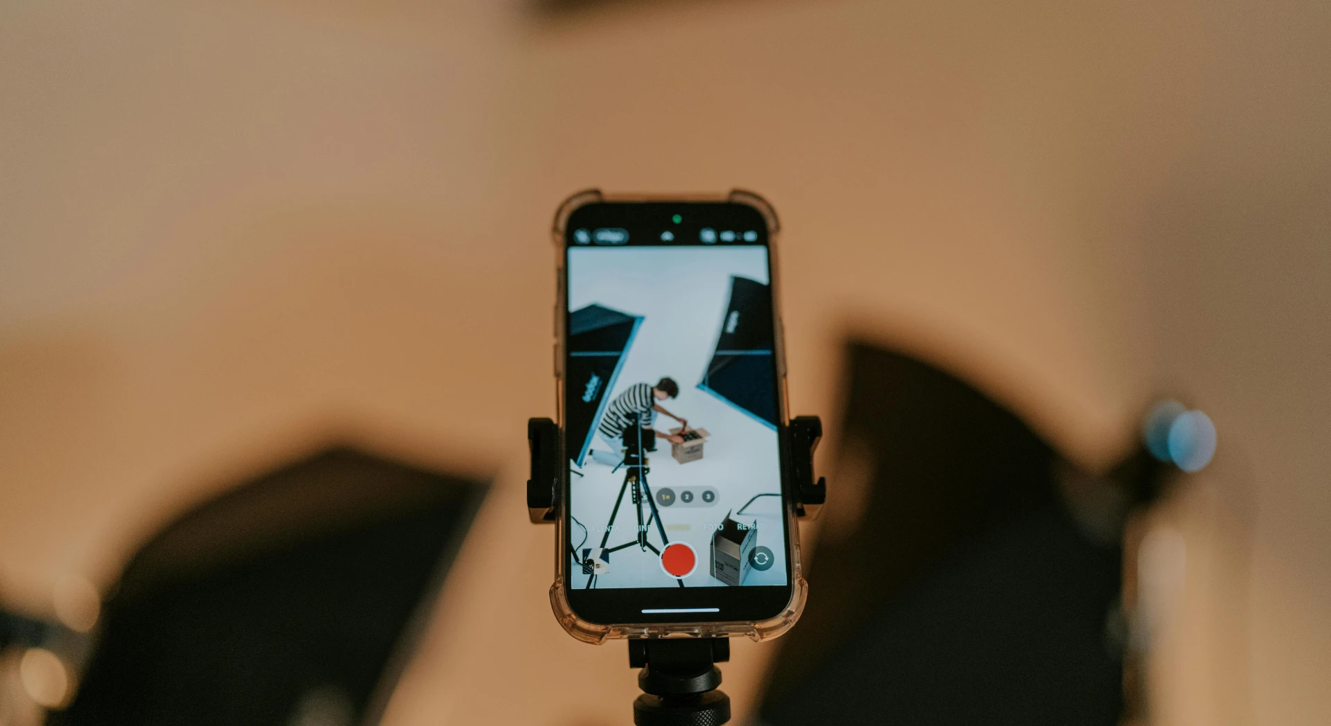 A phone set up to record a behind-the-scenes type of short-form video content