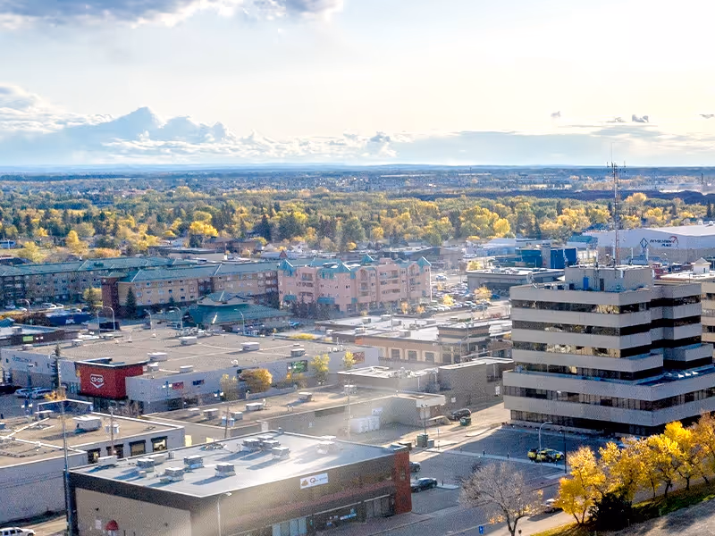 An aerial view of a city with a lot of buildings