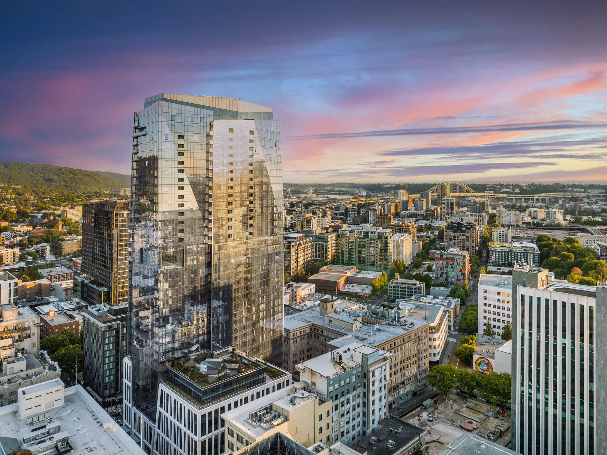 Block 216 buliding at rising over the Portland skyline