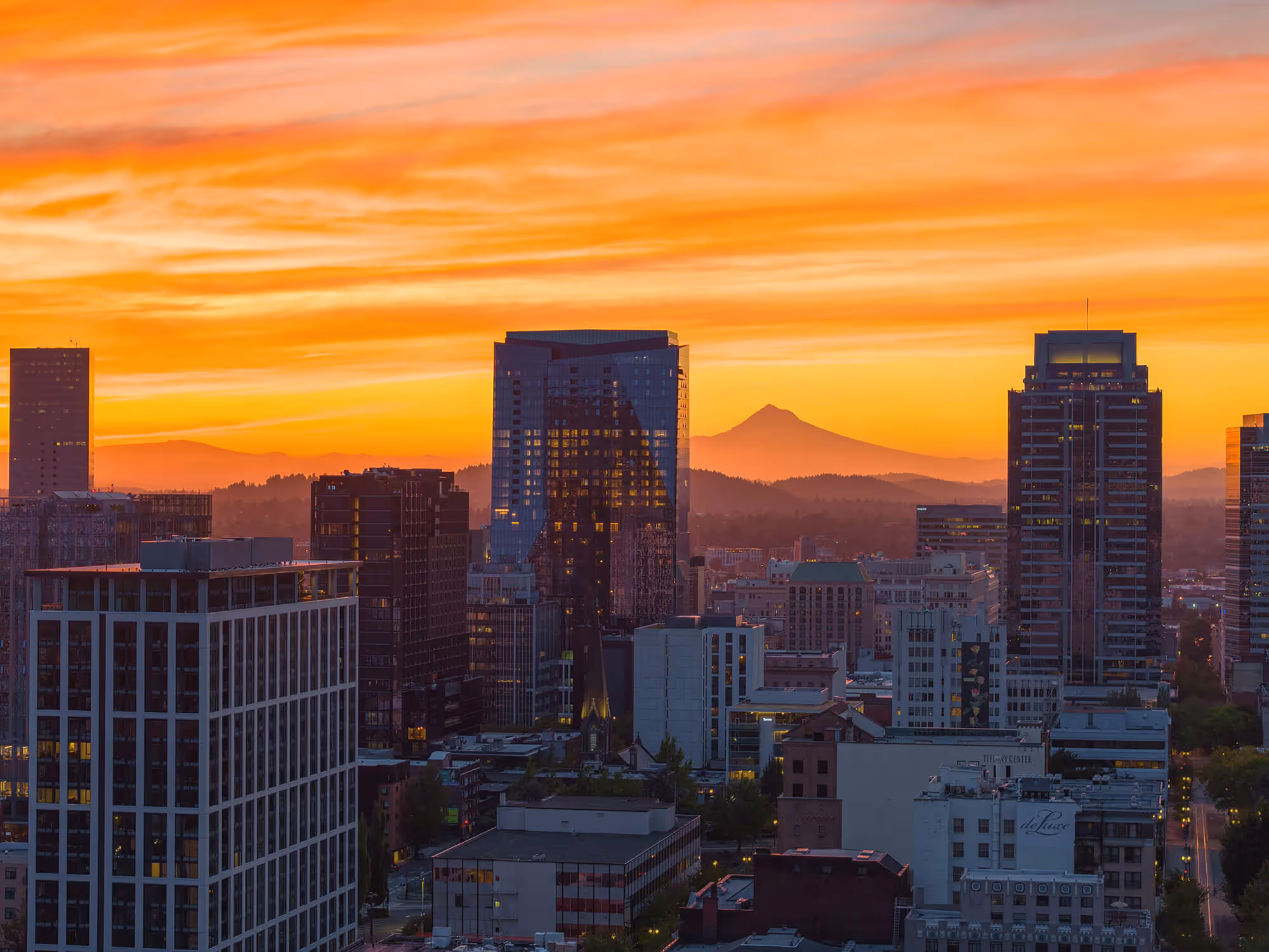 The Ritz-Carlton Residences, Portland reflect the stunning sunrise over Mt Hood
