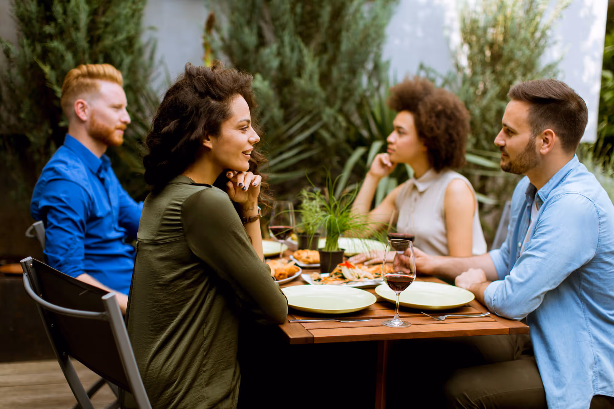 Two couples dining al fresco