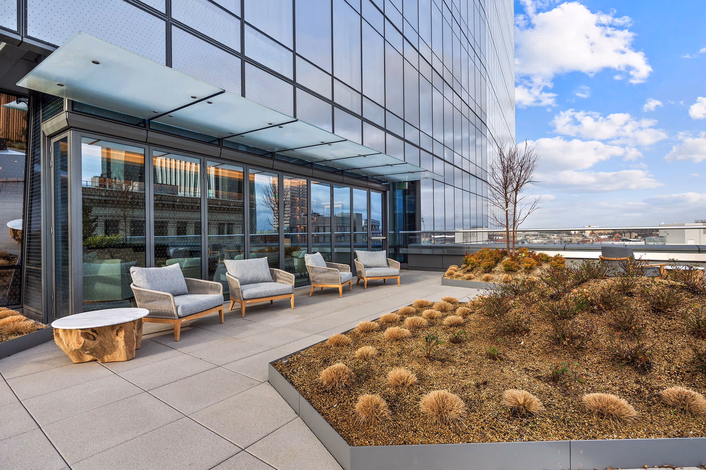 Seating on the rooftop terrace of the Exclusive Owners' Lounge