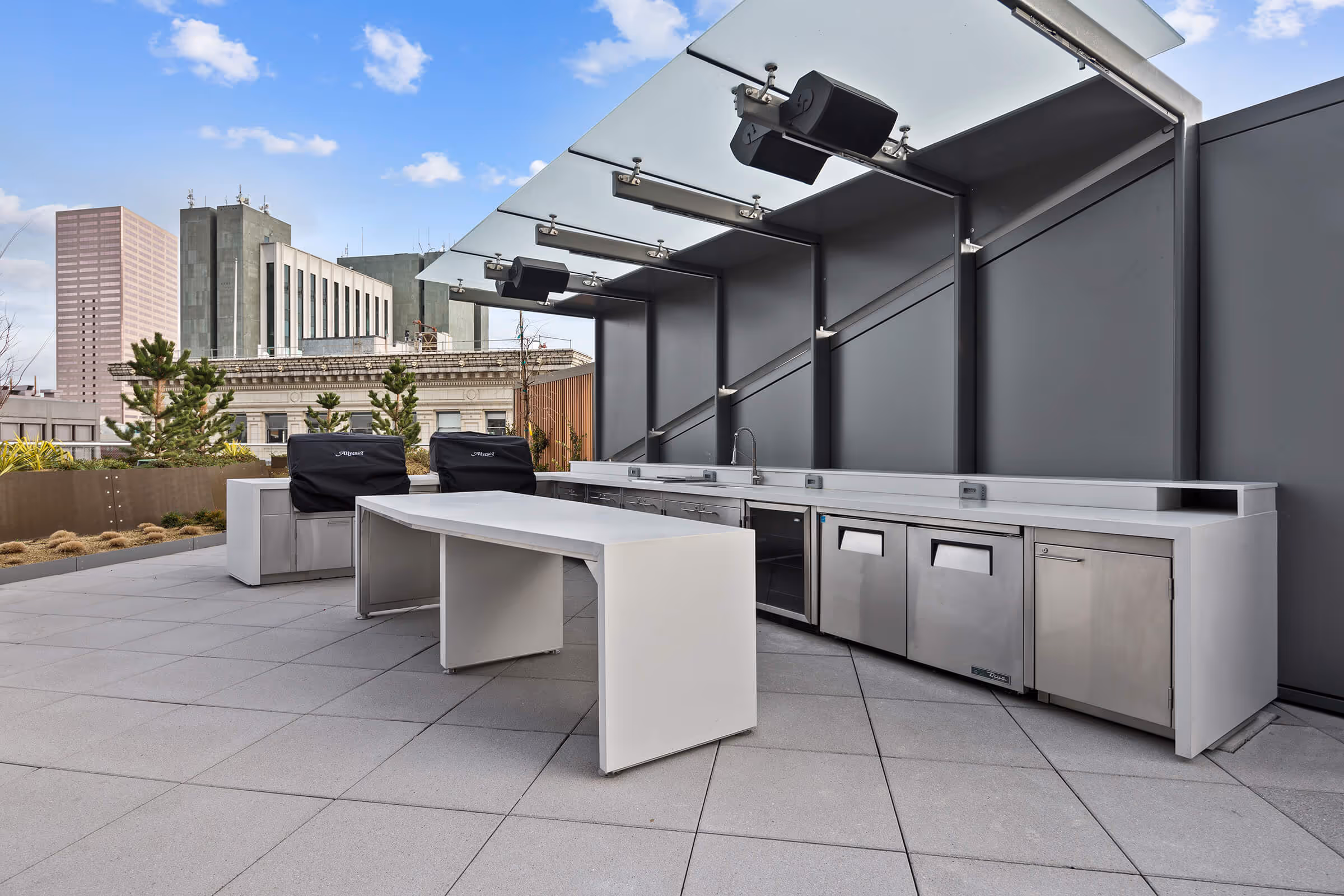 Outdoor kitchen on the rooftop terrace of the Exclusive Owners' Lounge