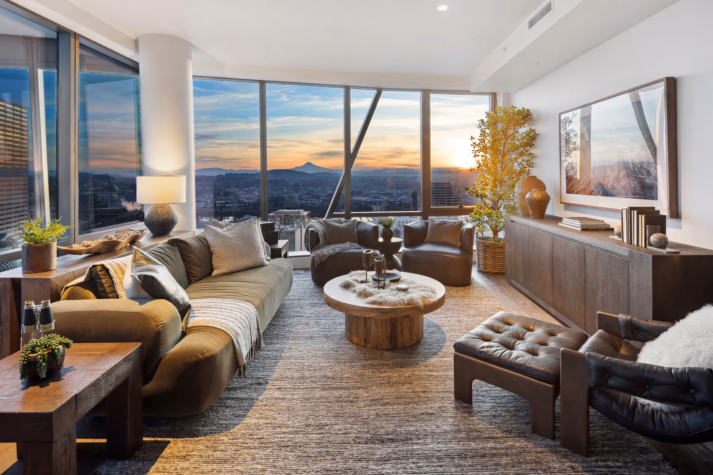 Residence living area with view of Mt. Hood silhouetted against the sunrise