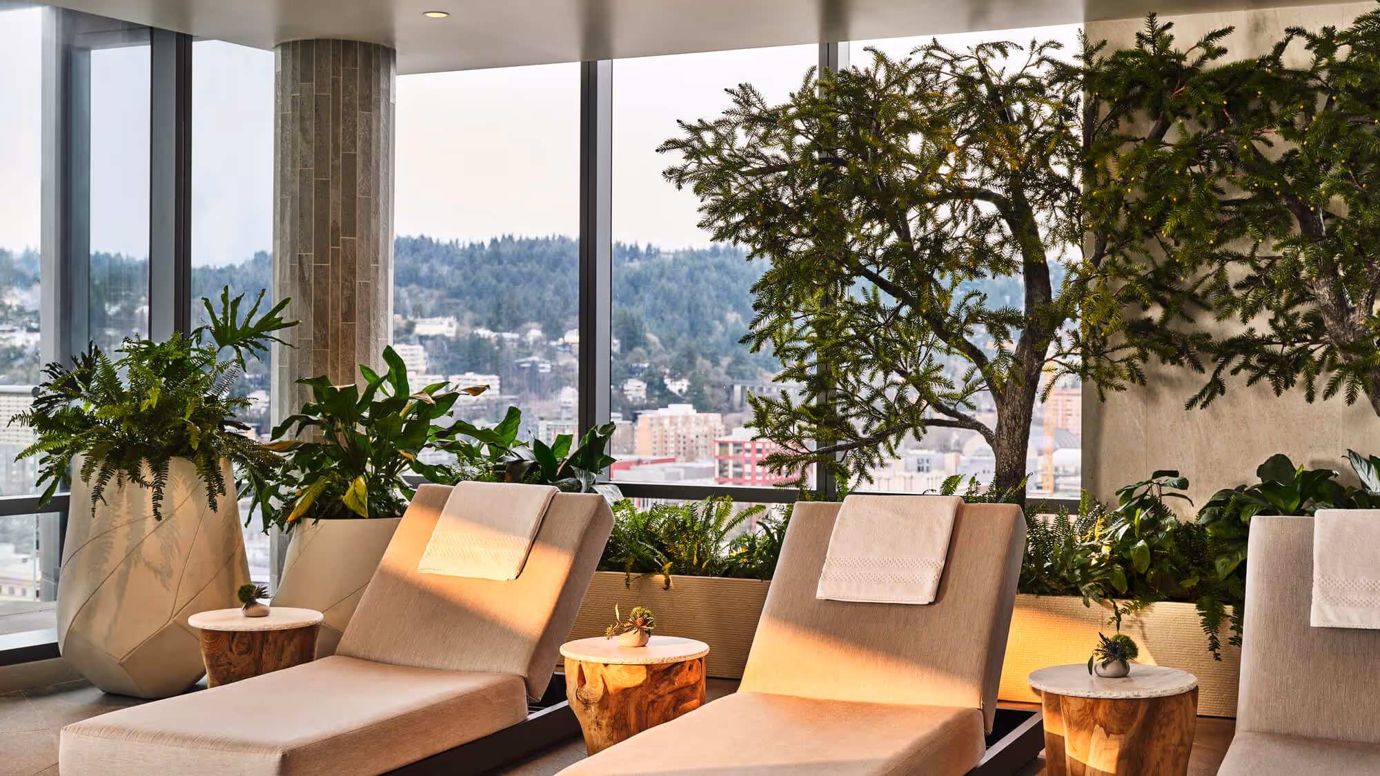 Relaxing poolside seating at Hidden Mountain Lake Infinity Pool at The Ritz-Carlton Residences, Portland