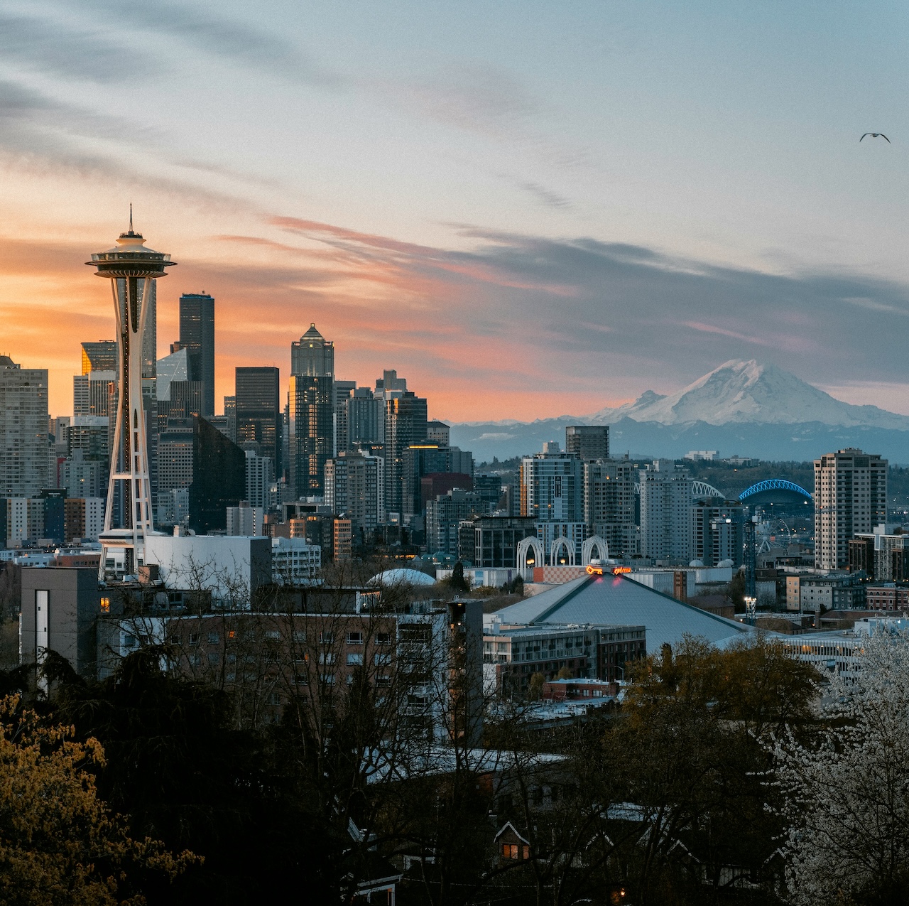 a skyline image of Seattle at sunset