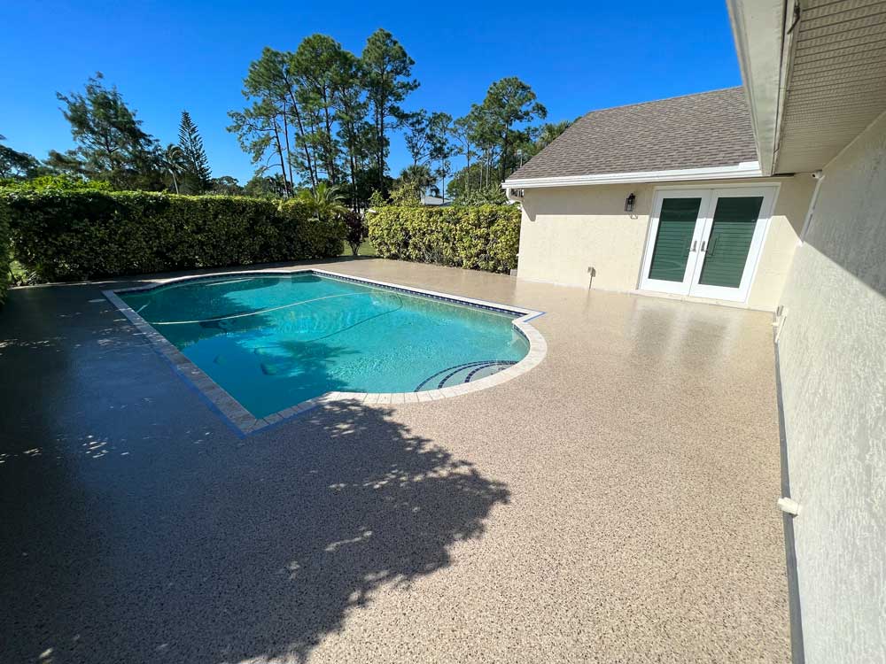 Backyard of a house with a pool.