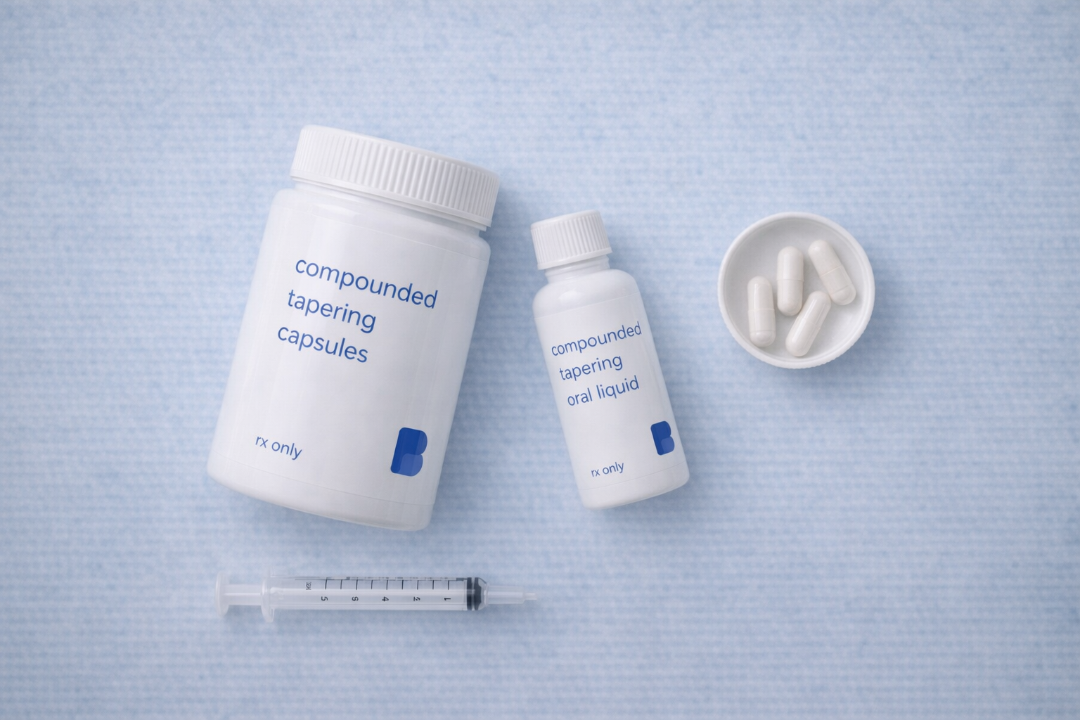 Medication tapering capsules and oral liquid with an oral syringe, compounded by Bayview Pharmacy