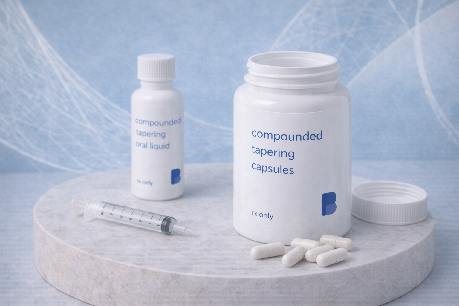 An open bottle of compounded tapering capsules beside a tapering oral liquid and an oral syringe