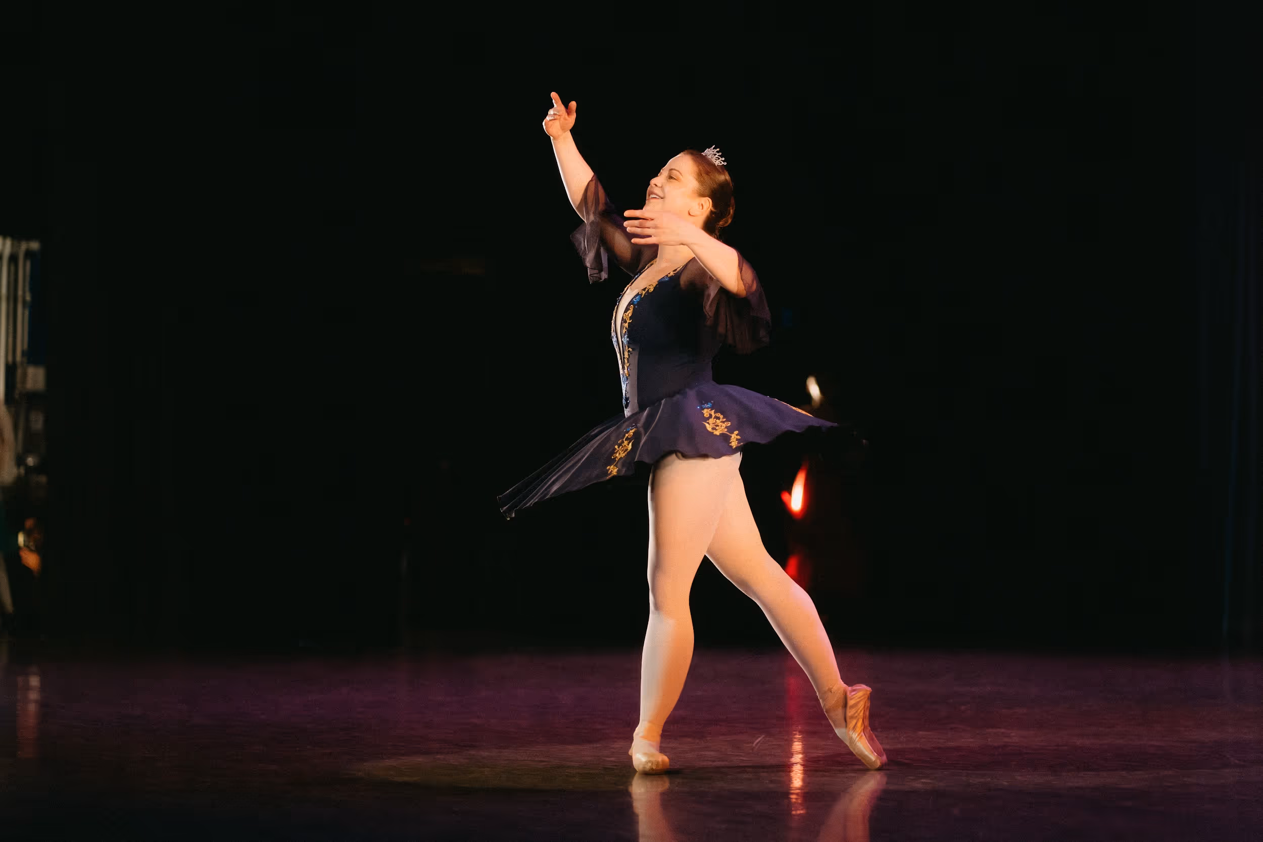 Amateur adult student of the Russian Ballet School performing on stage at Betty Oliphant Theatre