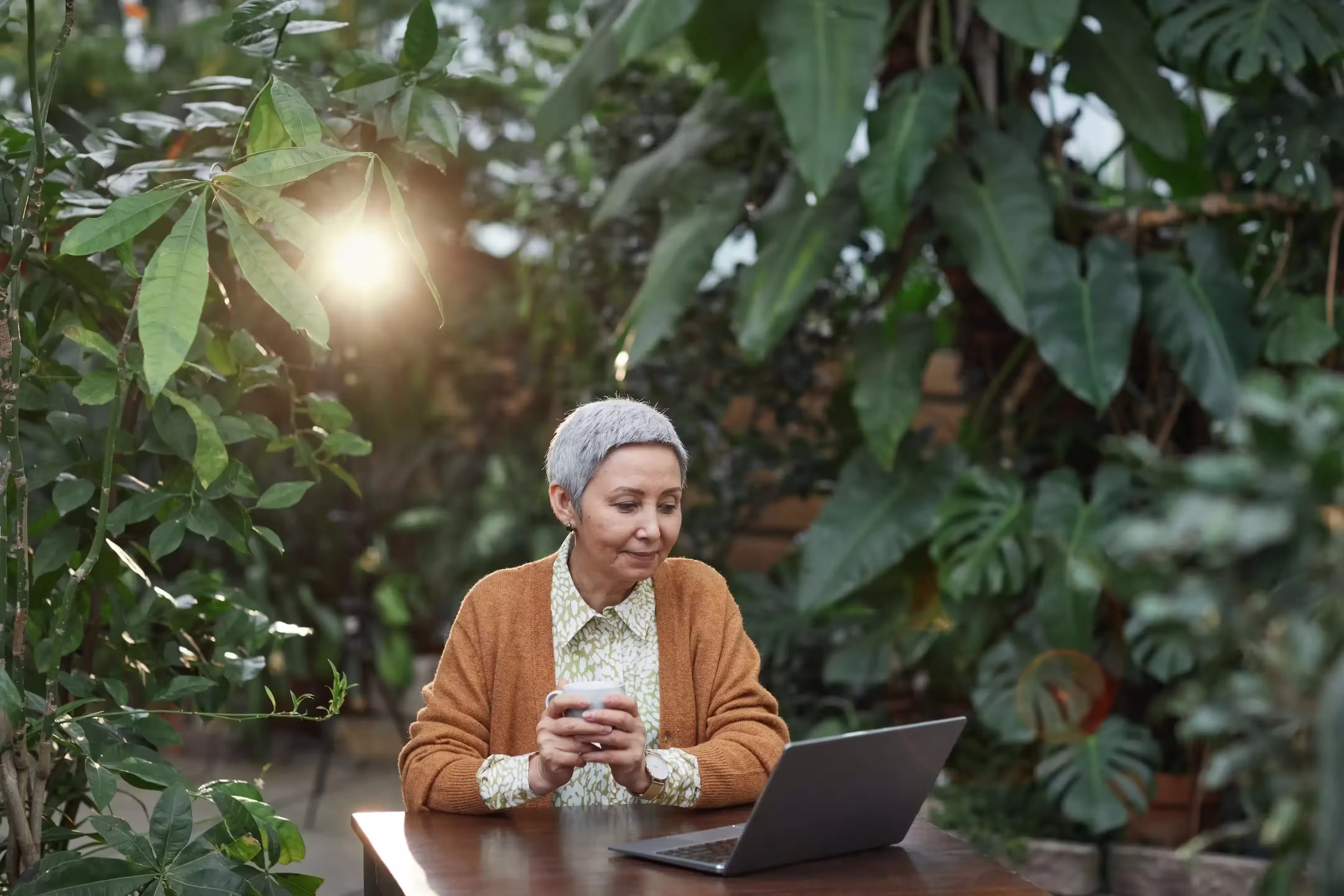 Old woman at a beautiful cafe