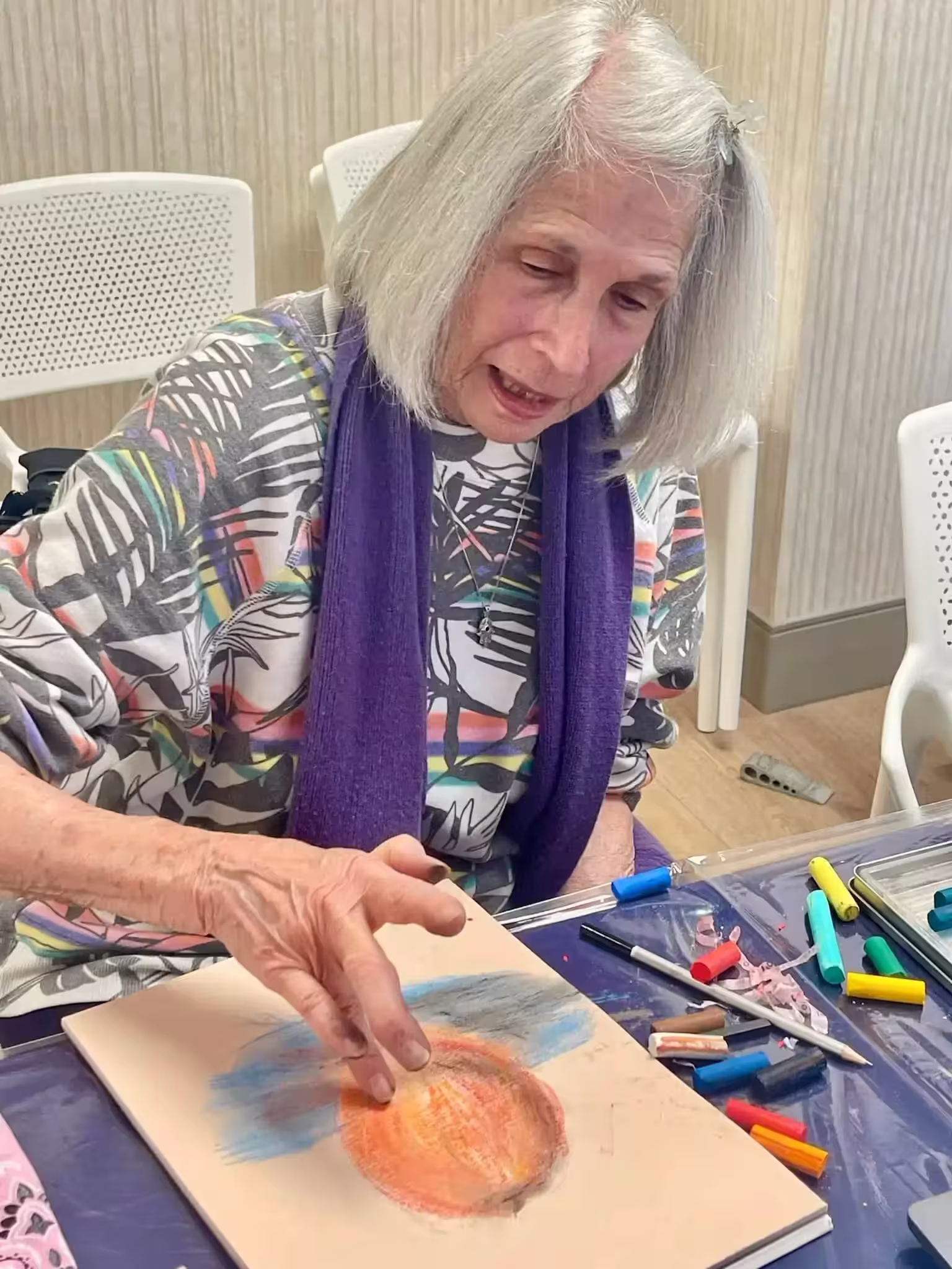 Senior woman creating artwork