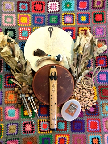 Some sound healing tools: drum, flute, rattle, leaves, kalimba, mouth harp