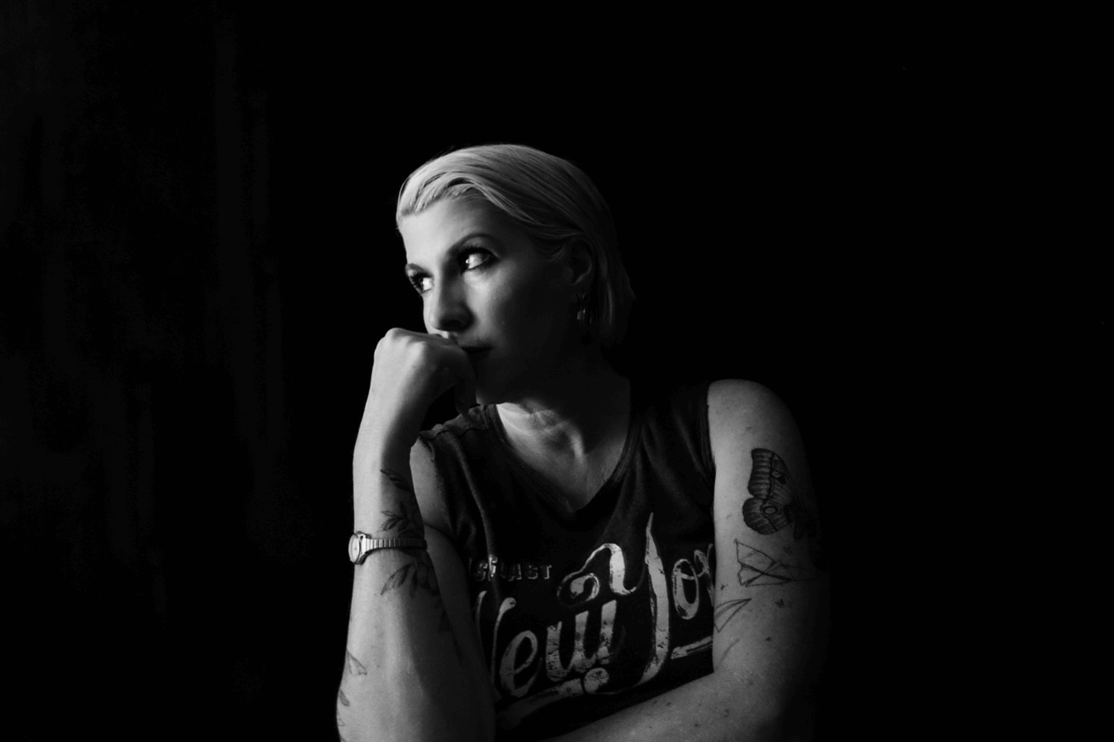 Toni with finger in nose