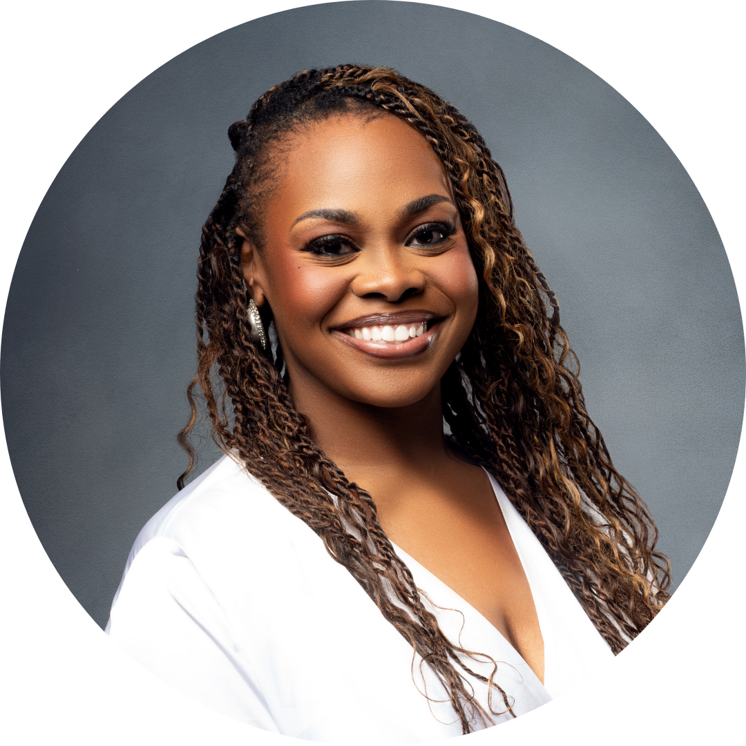 A professional headshot of a woman