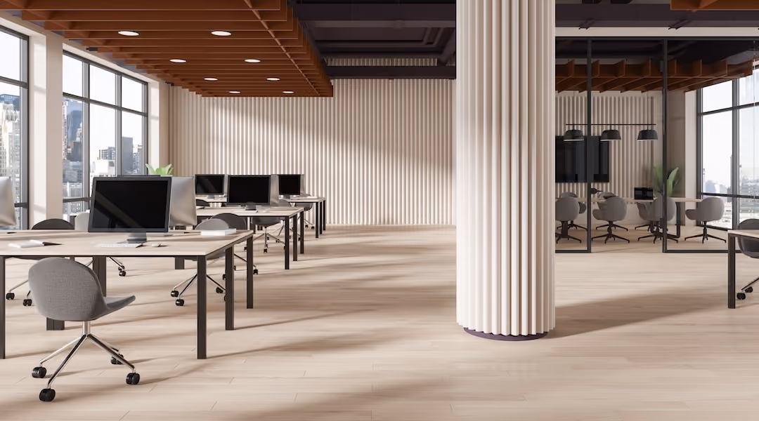 Modern office interior with desks, chairs, and computer monitors, on a bright daylight background. Concept of workspace. 3D Rendering.  Standard license (1 Plan credit)