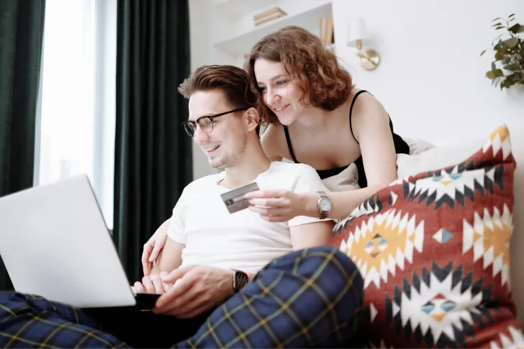 Couple buying on laptop