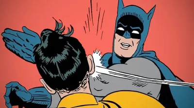 Meme clássico do Batman dando um tapa no Robin