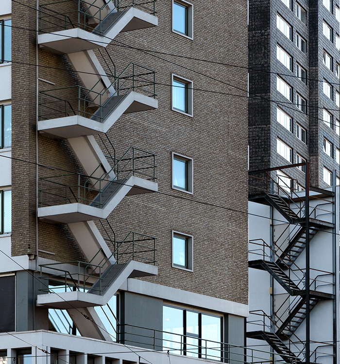 Old architecture and new architecture divided diagonally by a line.