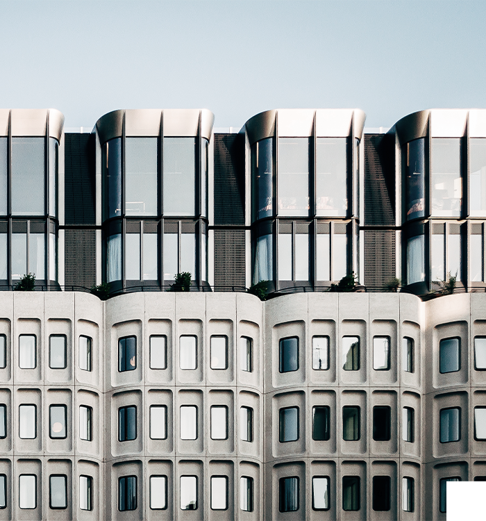 Old architecture and new architecture divided diagonally by a line.