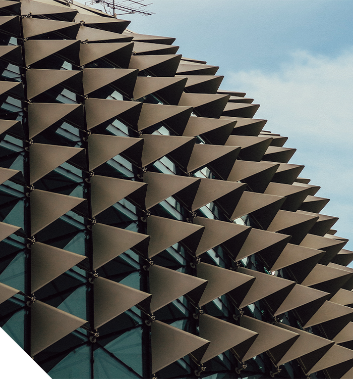 Old architecture and new architecture divided diagonally by a line.