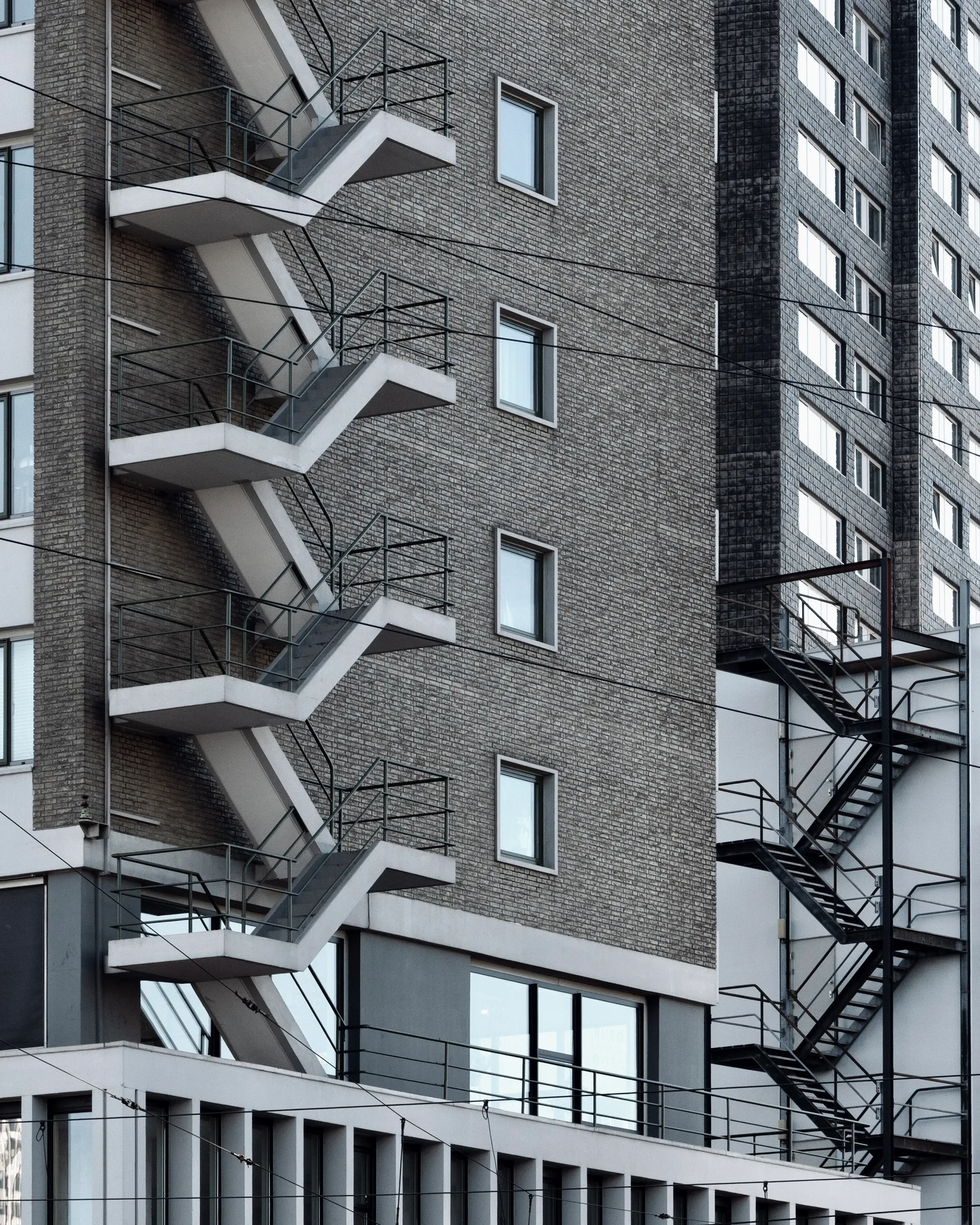 Old architecture and new architecture divided diagonally by a line.