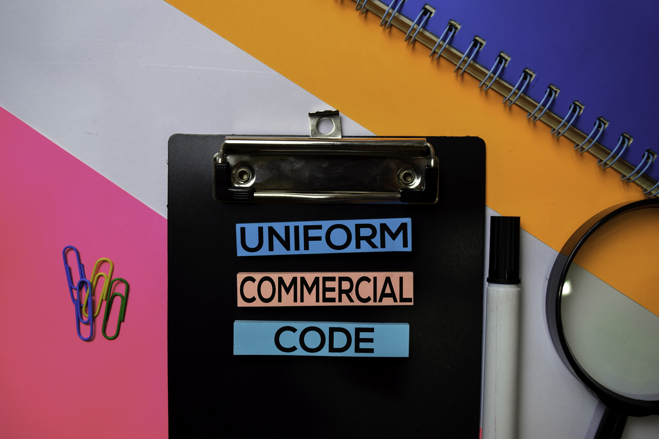 clipboard with Uniform Commercial code