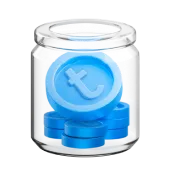 Lasipurkki, jossa on sinisiä kolikoita, joista yksi on painettu t-kirjaimella.