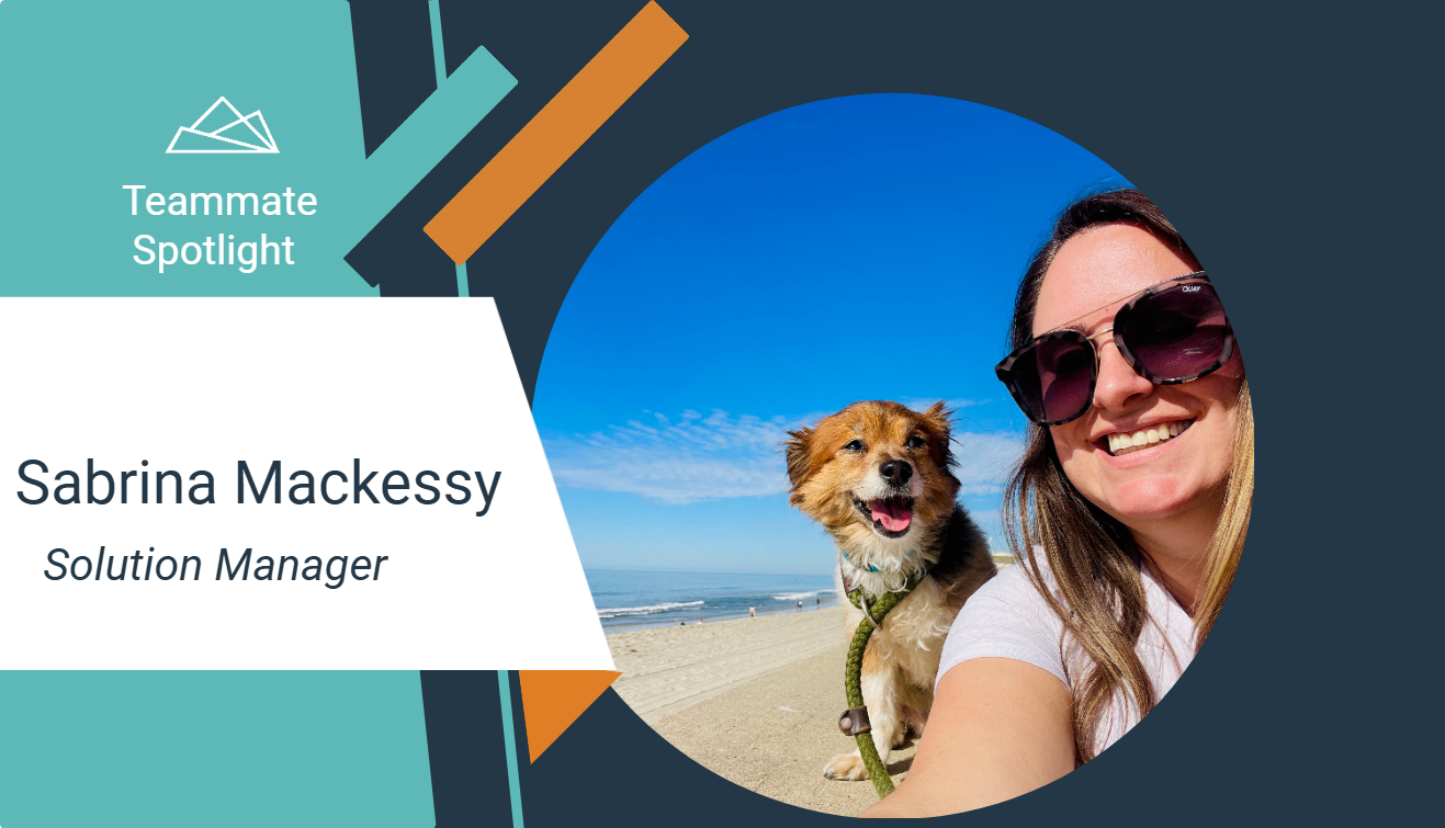 The image is a "Teammate Spotlight" graphic featuring Sabrina Mackessy, identified as a Solution Manager. The design includes geometric shapes and a teal and navy color scheme. On the right side, there is a circular photo of Sabrina at the beach with a happy brown and white dog sitting beside her. The sky is clear and blue, and the ocean is visible in the background.